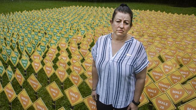 Mother Natalie Sonenko who lost her son to a rural road accident earlier this year in the field of hearts commemorating all those who have died on Australian roads last year. Picture: Brian Cassey