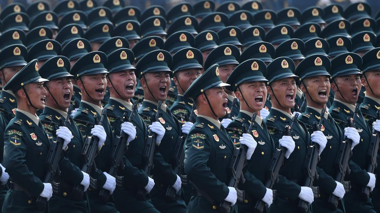 Chinese troops marching during a military parade in Tiananmen Square in Beijing to mark the 70th anniversary of the founding of the People's Republic of China in October 2019. Picture: Greg BAKER / AFP.