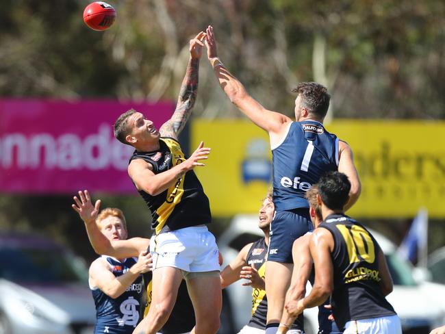 30.3.2018.SANFL. South vs Glenelg at Hickinbotham Oval, Noarlunga. Jesse White and Keegan Brooksby go up for the ruck.  PIC:TAIT SCHMAAL.