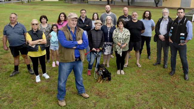 Alberton residents, including Peter Sossic (front, brown vest) are locked in a stoush with the Port Adelaide Football Club over a planned $20 million redevelopment of Alberton Oval and surrounds. Picture: Naomi Jellicoe