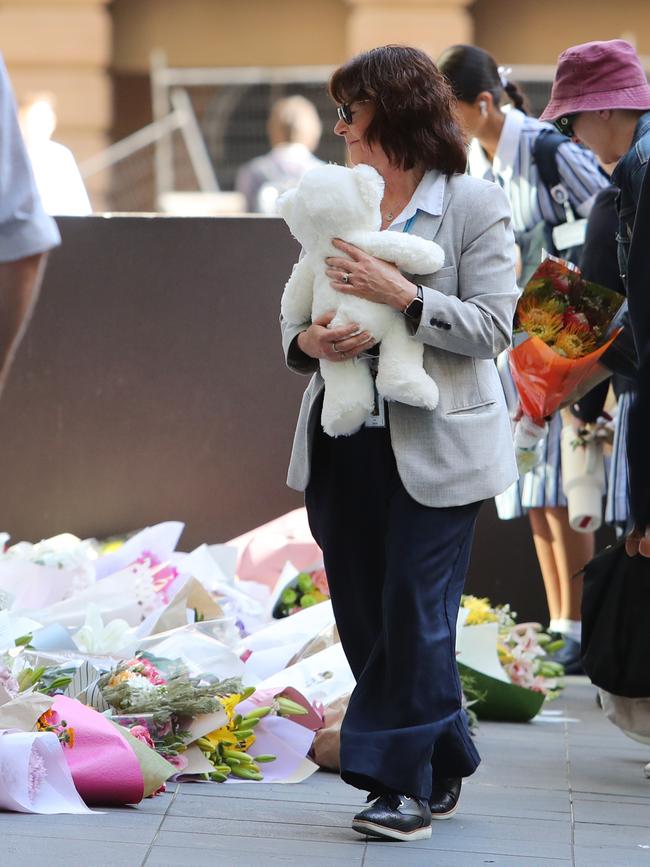 Mourners at St Andrew’s Cathedral School on Monday. Picture: Rohan Kelly