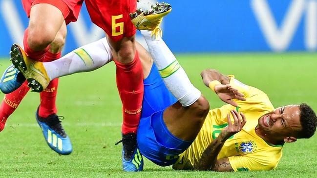 This has been a familiar scene all World Cup ... Neymar on the ground. Picture: AFP.