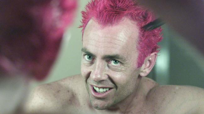 09/07/2001. The Ashes tour. Colin "Funky" Miller dyes his hair red this evening in his hotel room in Birmingham.