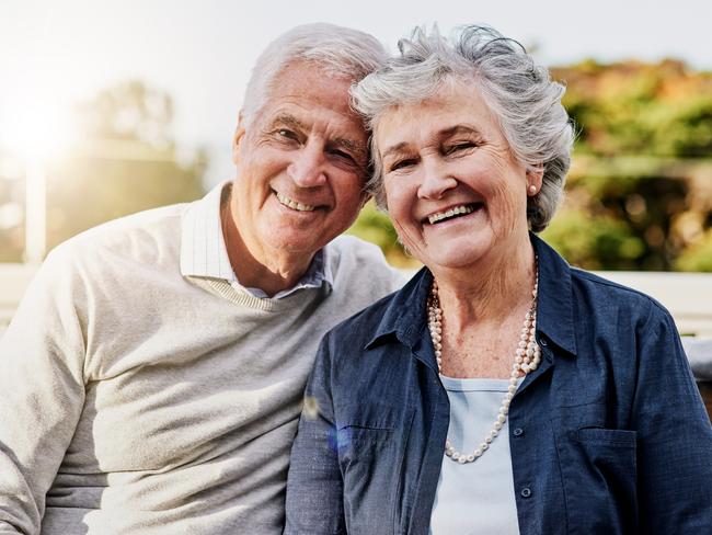 Shot of a happy senior couple relaxing together outdoors; retirees, seniors generic