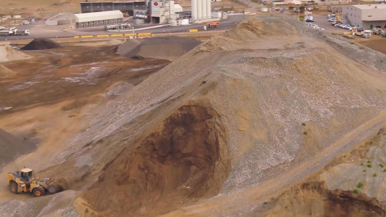 A huge mound of glass waiting to be recycled at Alex Fraser’s facility in Clarinda, southeast Melbourne. Source: Alex Fraser