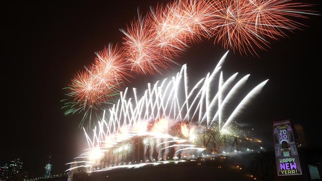 Fireworks explode above the Sydney Harbour Bridge last year, as seen from Kirribilli. Picture: AAP /Dan Himbrechts