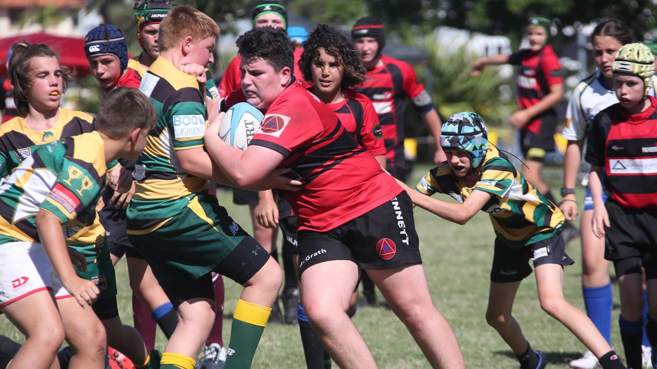 King of the Country U/13 Rugby Union tournament at Overall park Southport. Surfers Paradise(Yellow Green ) V Far North Coast (red black). Picture Glenn Hampson