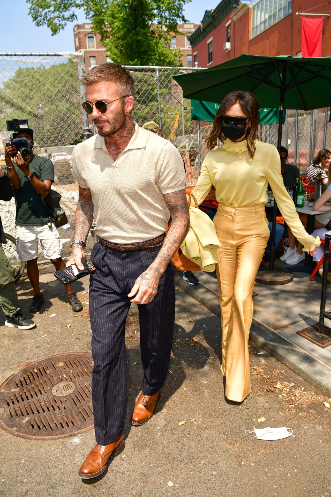 <h2>2021</h2><p>&nbsp;</p><p>Even off-duty in the summertime, Beckham&rsquo;s dad style takes no breaks. A neat pair of pinstripe trousers paired with a perfectly-fitting polo.</p>