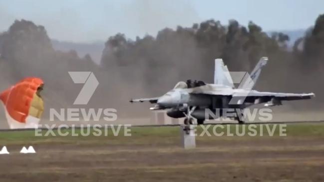 7News screen grab of the F/A-18 Super Hornet that was involved in an emergency situation during takeoff that saw two pilot eject from the plane Picture 7News