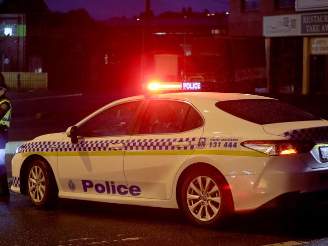 Generic Tasmania Police car. Tas Police. Tasmania Police. Logo. Police lights. Night. dark. Car Crash. Accident. Rain. Picture: PATRICK GEE
