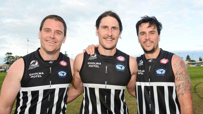 Former AFL star Ryan Griffen, centre, returned to his original club Goolwa-Port Elliot in 2019 to play with his brothers Travis, left and Trent, right. Picture: AAP/Brenton Edwards