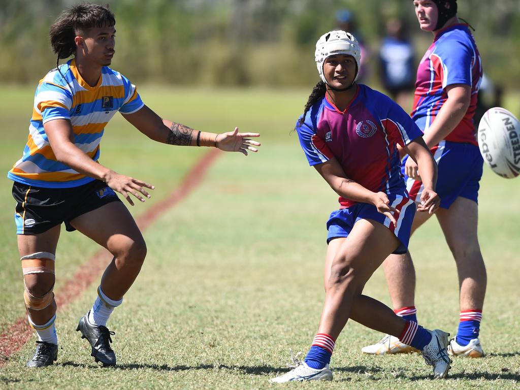 Boys Rugby League State Championship held at Northern Division, Brothers Leagues ground, Townsville. 16-18 years. Peninsula (stripe) v Darling Downs (blue/purple). Lyucian King-Togia of Our Lady of the Southern Cross College.