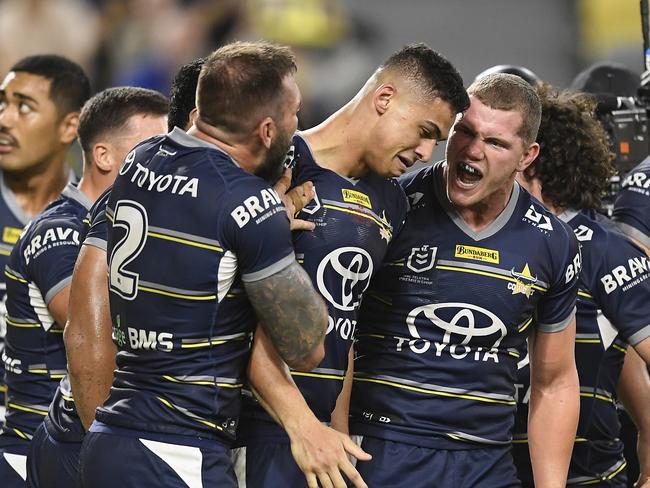 An emotional Heilum Luki after scoring a try on debut. (Photo by Ian Hitchcock/Getty Images)