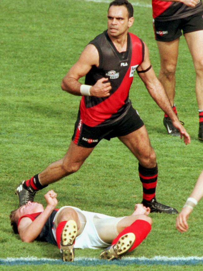 Michael Long signalled Essendon’s intentions when he flattened Troy Simmonds.