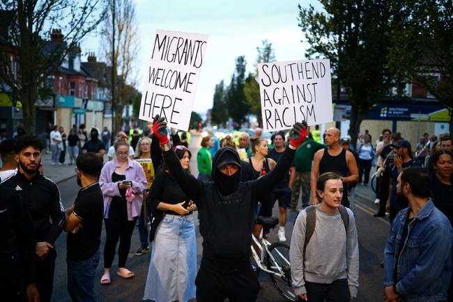 People protest against anti-immigrant violence instigated by the far right