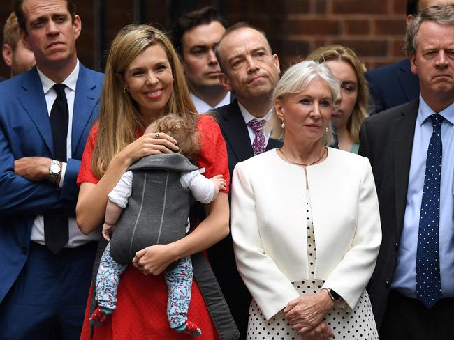 Boris Johnson’s wife, Carrie, and their daughter Romy, watch on. Picture: AFP