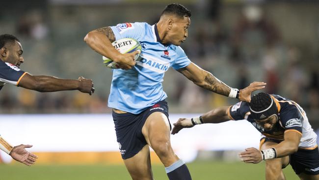 Waratahs star Israel Folau in action against the Brumbies on Saturday night. He was taken off injured in the fourth minute.