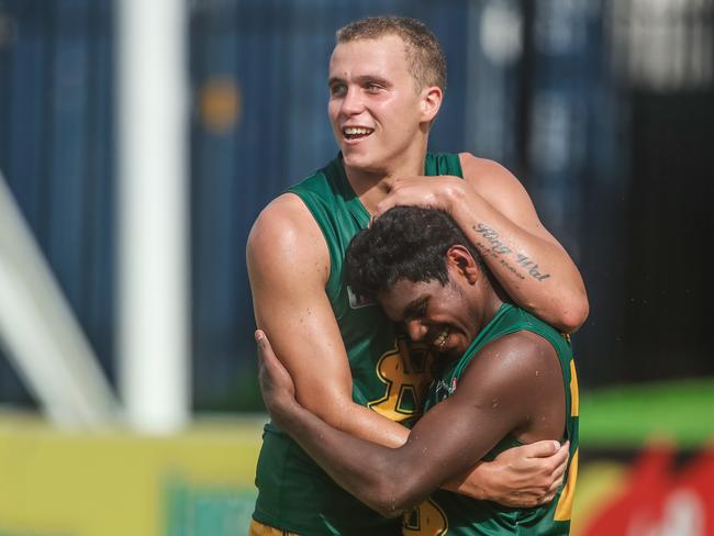 Former St Mary’s star and Richmond pick-up Maurice Rioli Jr celebrates a goal with Shaun Edwards. Picture: Glenn Campbell