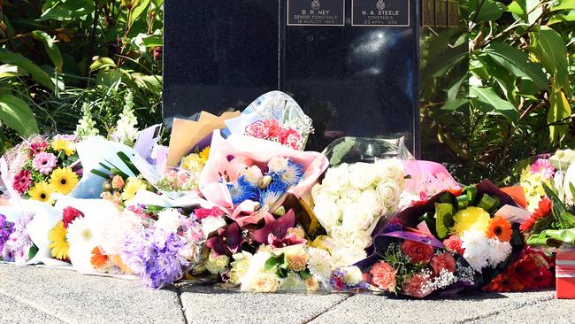 Flowers left at Toowoomba police station in honour of Brett Forte. Picture: Sarah Motherwell/AAP