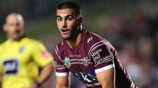 Tom Wright of the Sea Eagles looks to pass against the Storm at Brookvale Oval.