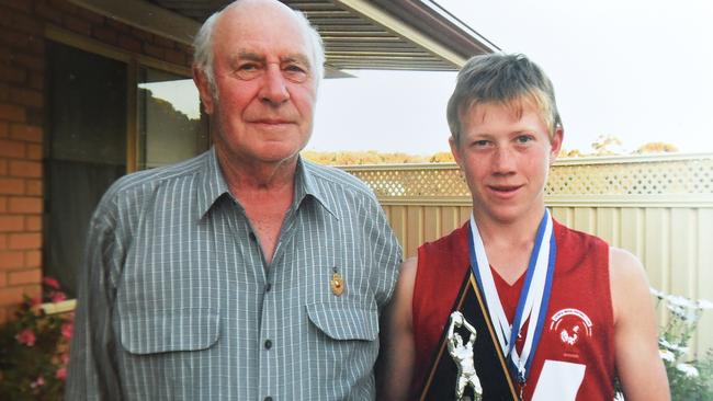 Campbell Combe with his late grandfather Peter Heinjus.