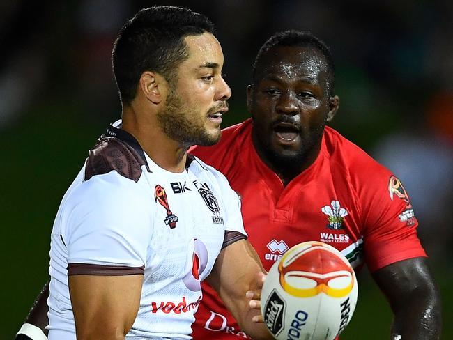 Jarryd Hayne takes on the Wales defence.