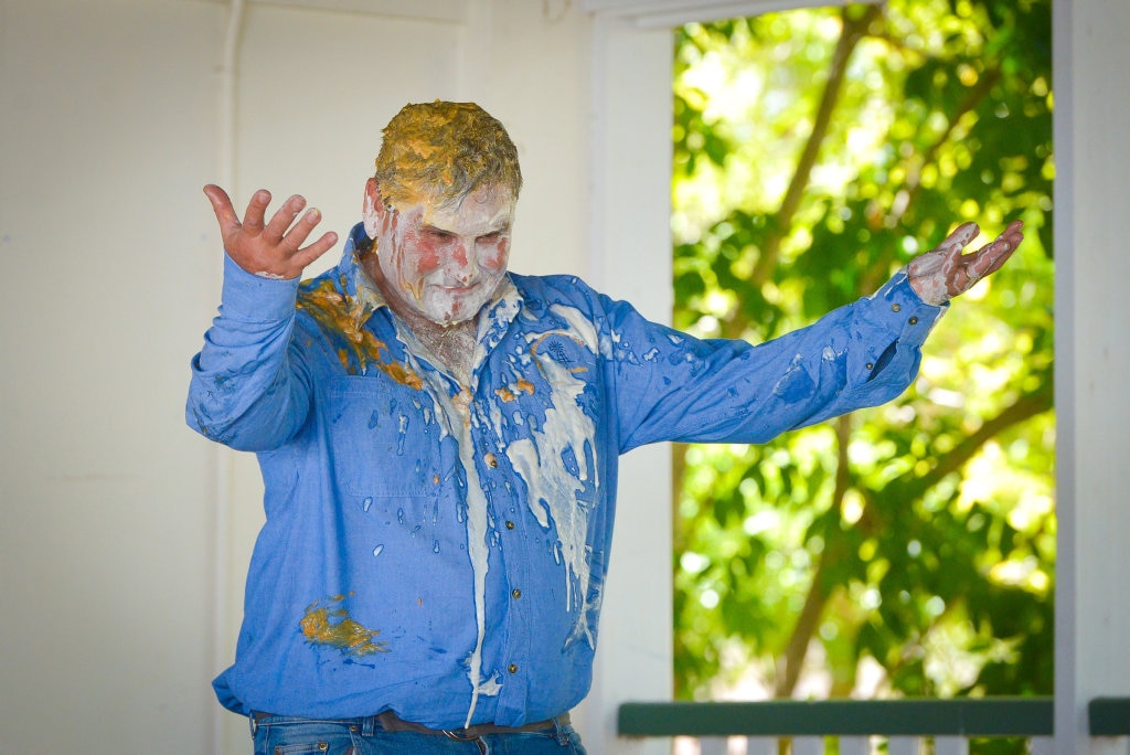 Teacher Norm HoranPIE IN THE FACE - Mt Larcom State School raises money for drought relief. Picture: Mike Richards GLA140918PIEF