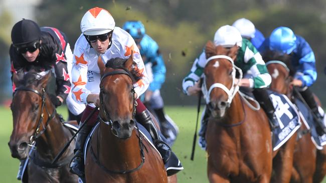 Jockey Hugh Bowman rides Farnan to victory in race 7, the Longines Golden Slipper, during Golden Slipper Day at Rosehill Gardens Racecourse in Sydney, Saturday, March 21, 2020. (AAP Image/Simon Bullard) NO ARCHIVING, EDITORIAL USE ONLY