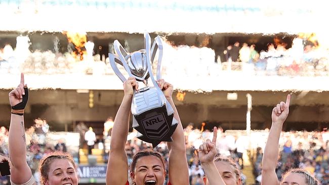 SYDNEY, AUSTRALIA - OCTOBER 02: The Knights celebrate with the NRLW Premiership Trophy after victory in the 2022 NRLW Grand Final match between Newcastle Knights and Parramatta Eels at Accor Stadium, on October 02, 2022, in Sydney, Australia. (Photo by Cameron Spencer/Getty Images)