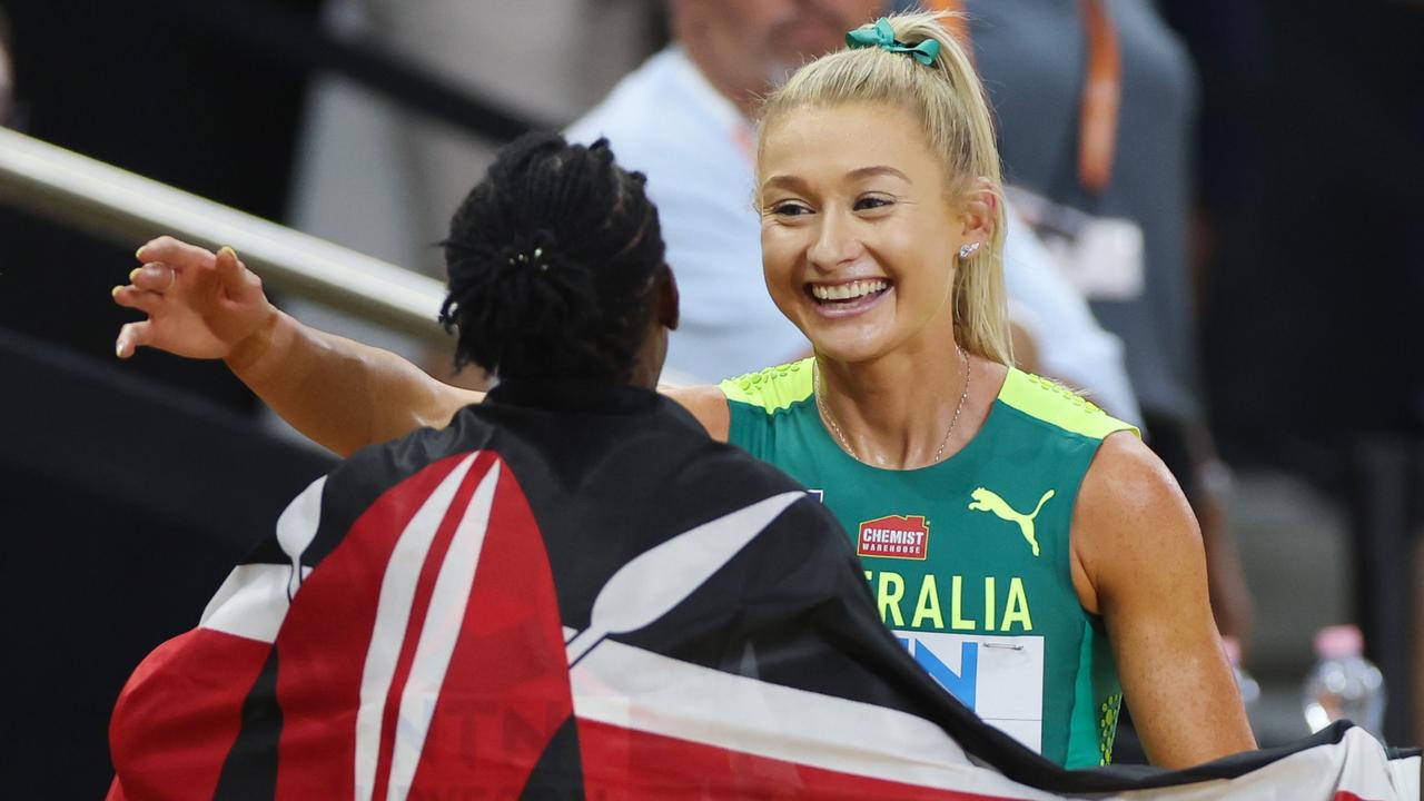 Faith Kipyegon and Jessica Hull after the final. (Photo by Steph Chambers/Getty Images)