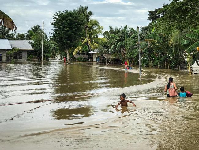 Residents evacuate to a safer place in Kabacan, North Cotabato, on the southern island of Mindanao. Picture: AFP