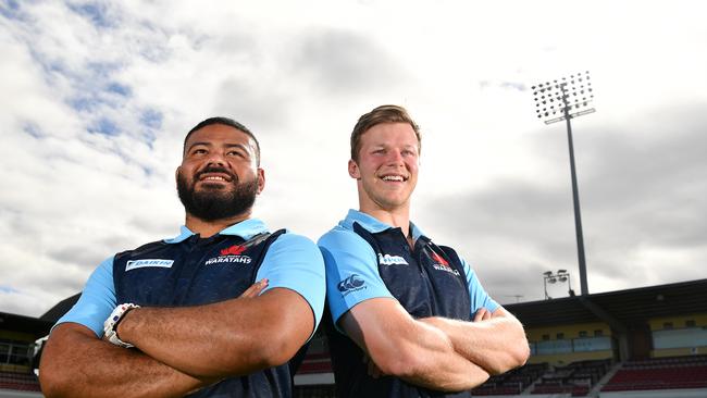 NSW Waratahs players Tolu Latu (left) and Cameron Clark pose for a photo at Brookvale Oval, Sydney, Tuesday, Dec. 5, 2017. The Waratahs are set to play a trial match at the venue. (AAP Image/Joel Carrett)