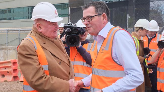 Lindsay Fox shakes hands with Victorian premier Daniel Andrews. Picture: NCA NewsWire/Luis Enrique Ascui