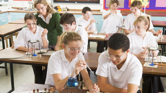 Generic stock image education Schoolchildren and Teacher in Science Class