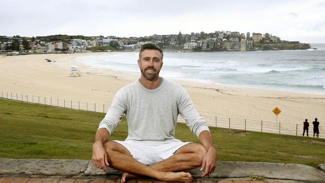 Luke McLeod founder of online live streamed meditation platform, Soul Alive, at Bondi Beach. Picture: John Appleyard