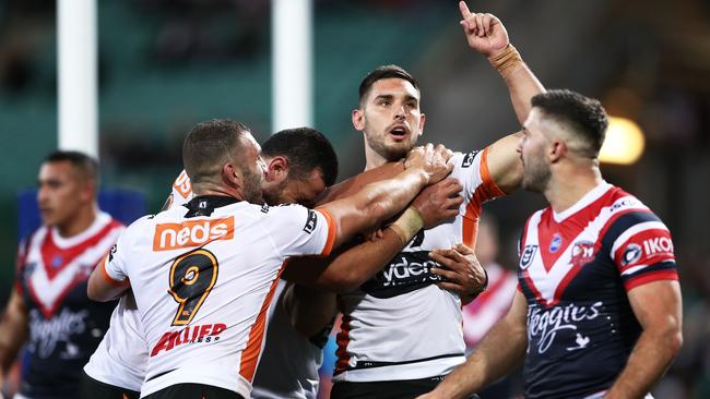 His Tigers teammates aren’t too impressed. Photo: Matt King/Getty Images