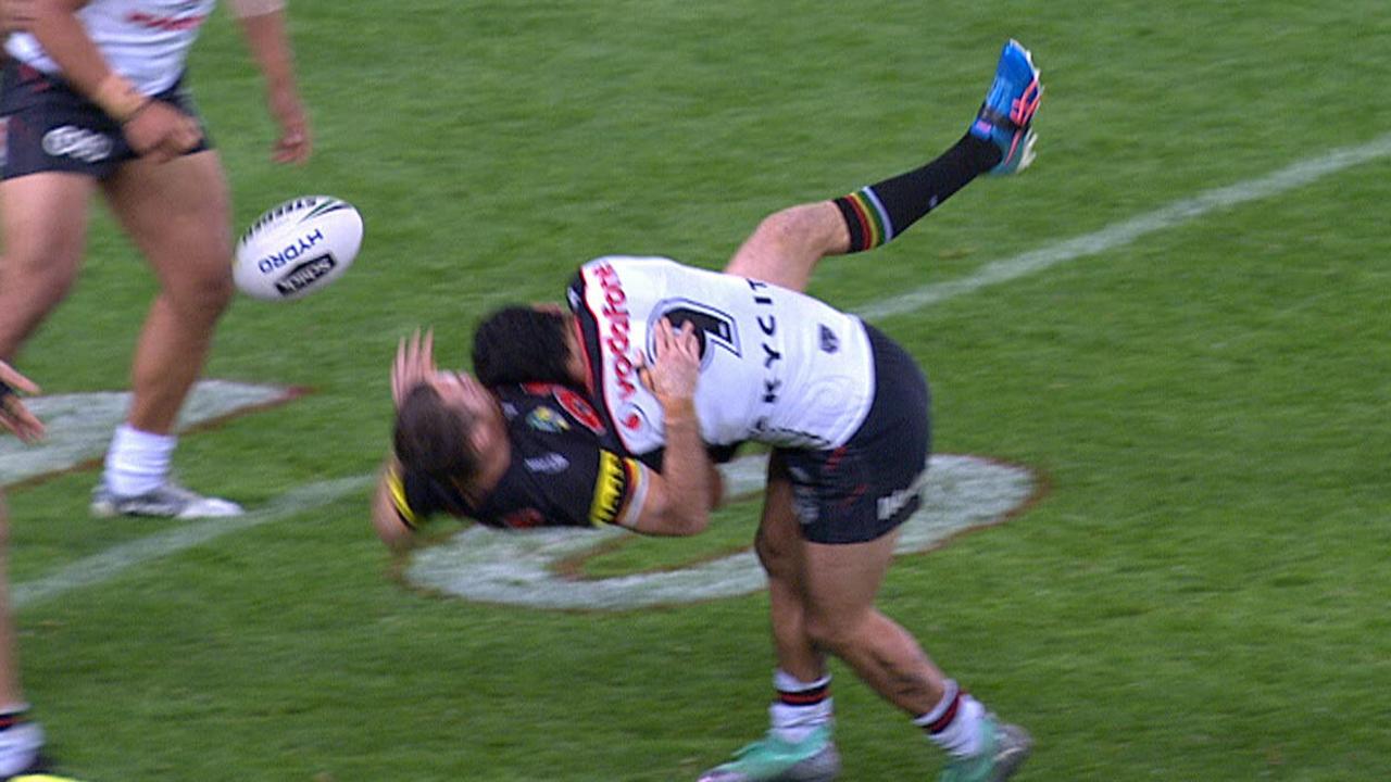 Issac Luke smashes James Maloney in a huge tackle.