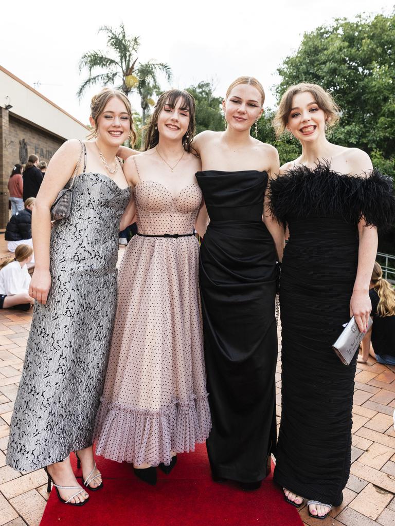 Arriving at Fairholme College formal are (from left) Bianca Wilson, Amelia ODea, Shakira Schultz and Georgia Quinn, Wednesday, March 29, 2023. Picture: Kevin Farmer