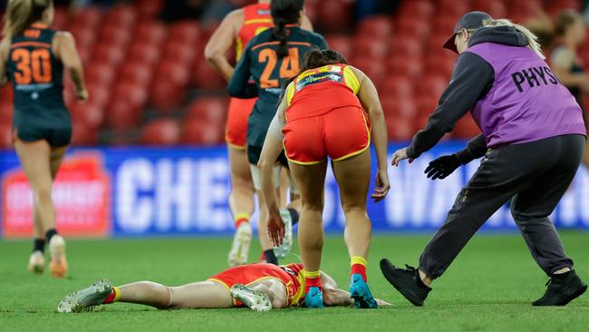 Barwick was motionless on the ground for a number of minutes. Picture: Russell Freeman/AFL Photos