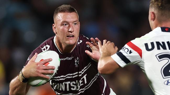 GOSFORD, AUSTRALIA - FEBRUARY 17: Sean Keppie of the Sea Eagles takes on the defence during the NRL Trial Match between the Sydney Roosters and the Manly Sea Eagles at Central Coast Stadium on February 17, 2023 in Gosford, Australia. (Photo by Matt King/Getty Images)