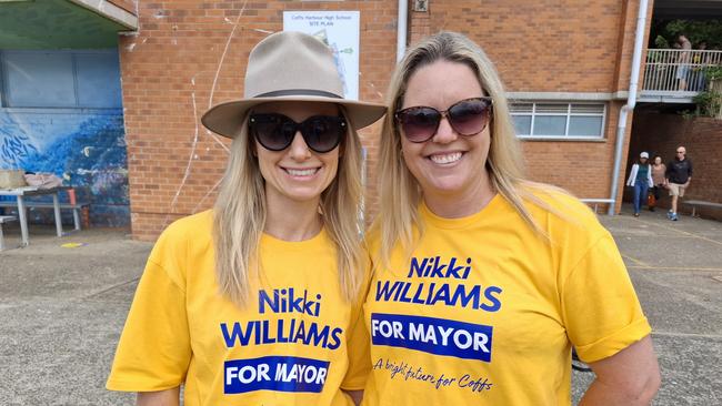 Josie Ward and Lynette Tomlinson supporting mayoral and councillor hopeful Nikki Williams at Coffs Harbour on election day.