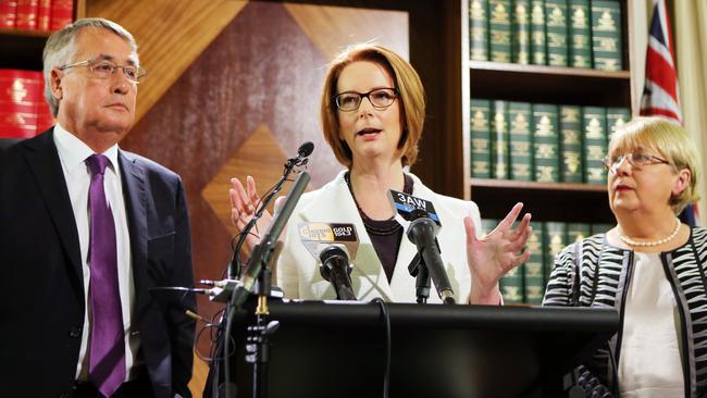 Then prime minister Julia Gillard, flanked by deputy Wayne Swan and then disability reform minister Jenny Macklin, after she announced an increase in the medicare levy in 2013 to fund the NDIS. Picture: Aaron Francis