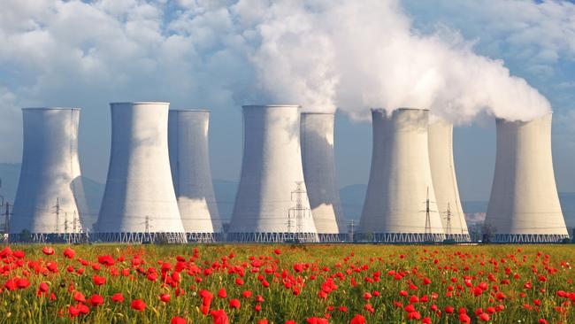 Nuclear Power plant with red field and blue sky