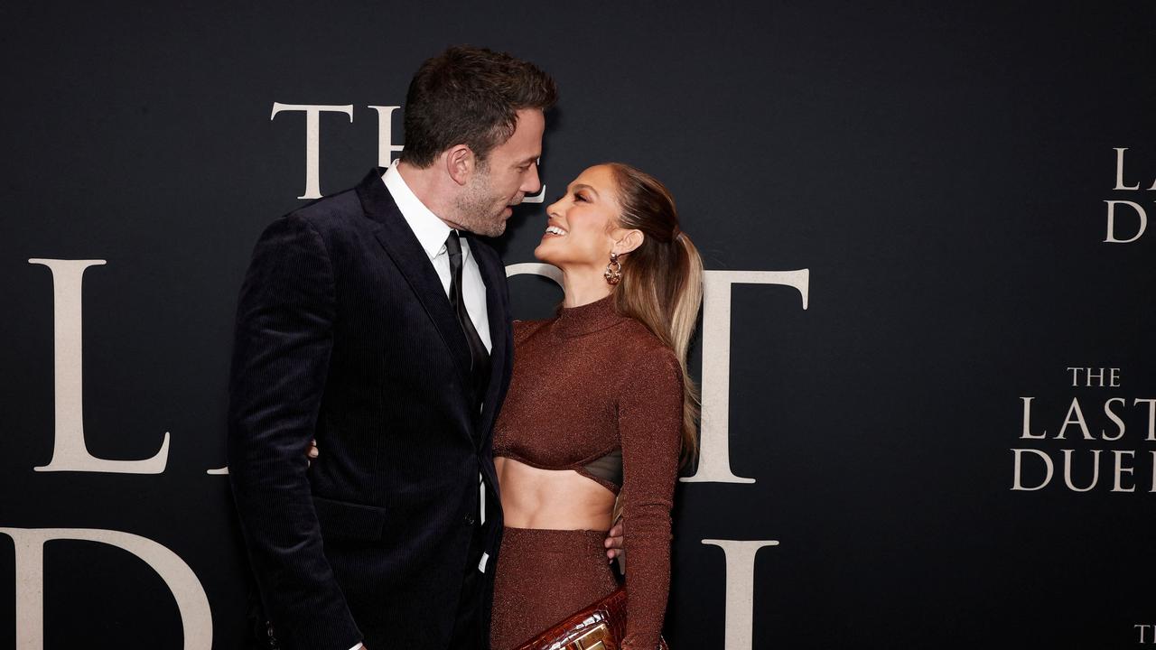 The couple embrace at “The Last Duel” New York Premiere. Credit: AFP