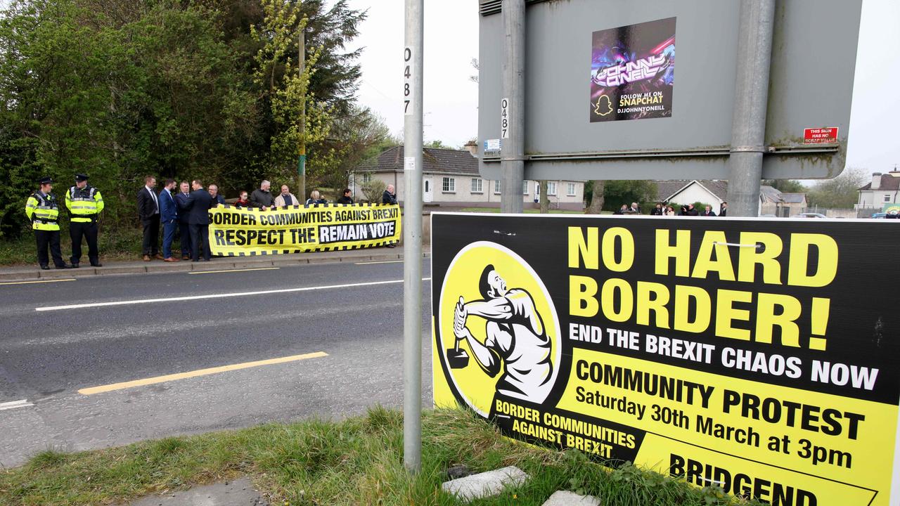 Anti-Brexit protesters gather at the border between Derry in Northern Ireland and County Donegal in the Republic of Ireland on April 18, 2019. Picture: Paul Faith/AFP