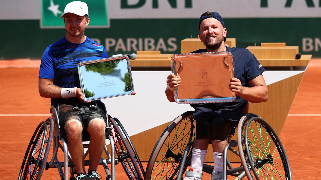 Australia’s Dylan Alcott (right) poses with runner up Sam Schroder of the Netherlands after the men’s quad wheelchair final of the 2021 French Open at Roland Garros on June 07, 2021 in Paris, France. Picture: Julian Finney/Getty Images.