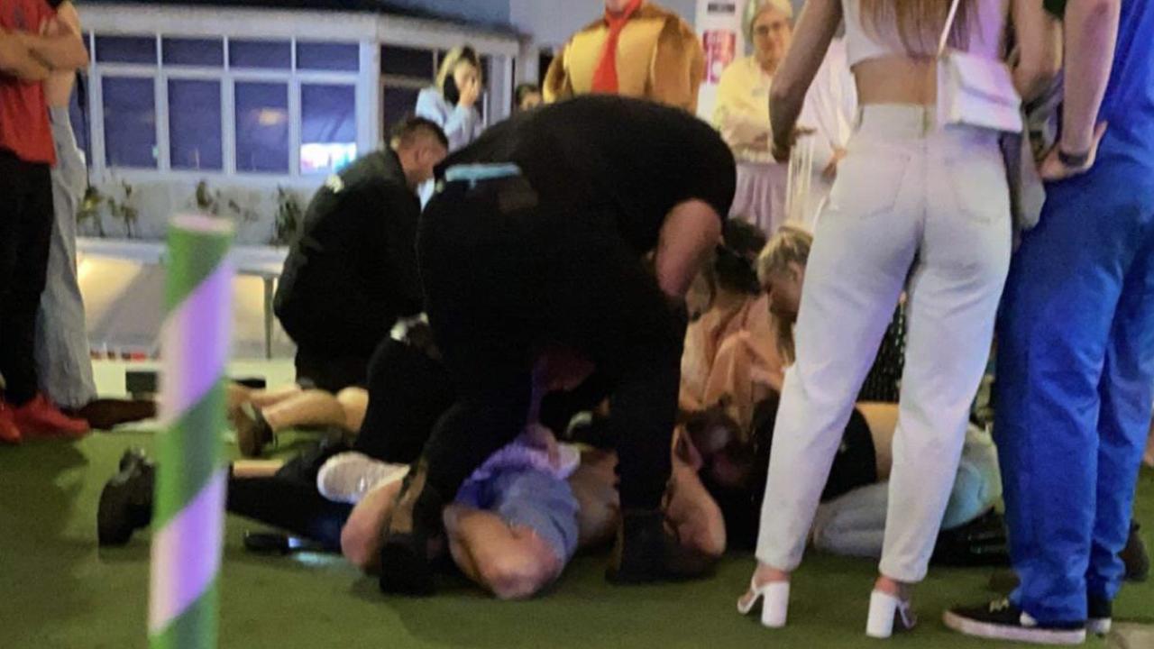 Photos have emerged of a wild all-in brawl involving four men and two women outside a popular Noosa Heads nightclub.