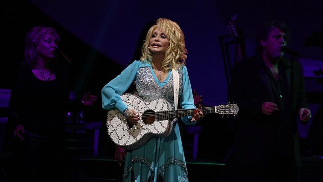 Dolly Parton sings, plays and certainly entertains. Picture: Adam Smith