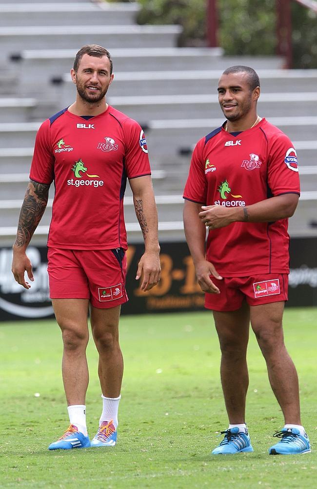 Reds Rugby star flyhalf Quade Cooper at Ballymore, hes with Will Genia. Pic Annette Dew
