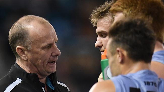  Power coach Ken Hinkley has some strong words with Ollie Wines on Friday night. Picture: AAP Image/Julian Smith